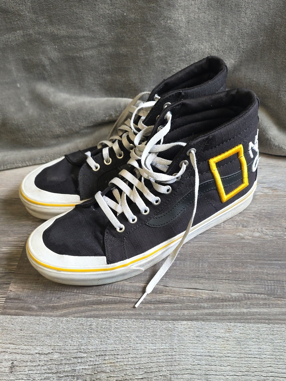 Vans Black High-Top Canvas Sneakers with National Geographic Yellow Patch